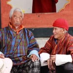 Bhutan - Old men chatting Bhutan people