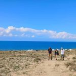 Walking past Issyk Kul lake in Kyrgyzstan